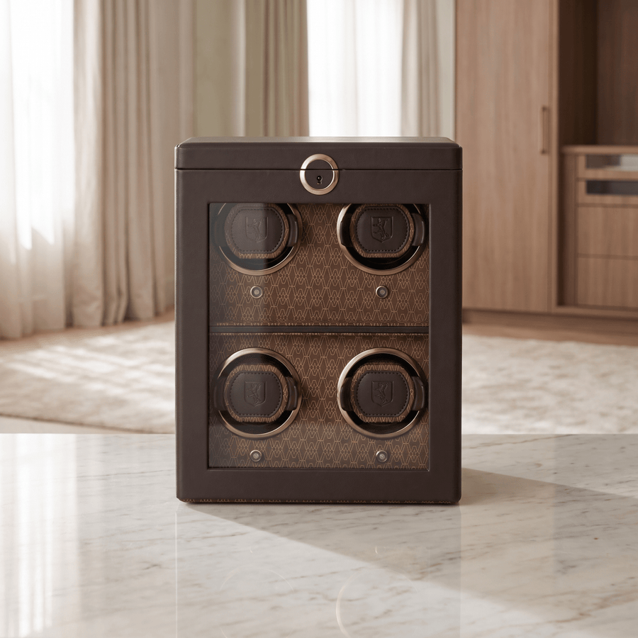 Wolf 1834 Earth watch winder 4 horloges Coffee op een marmeren oppervlak