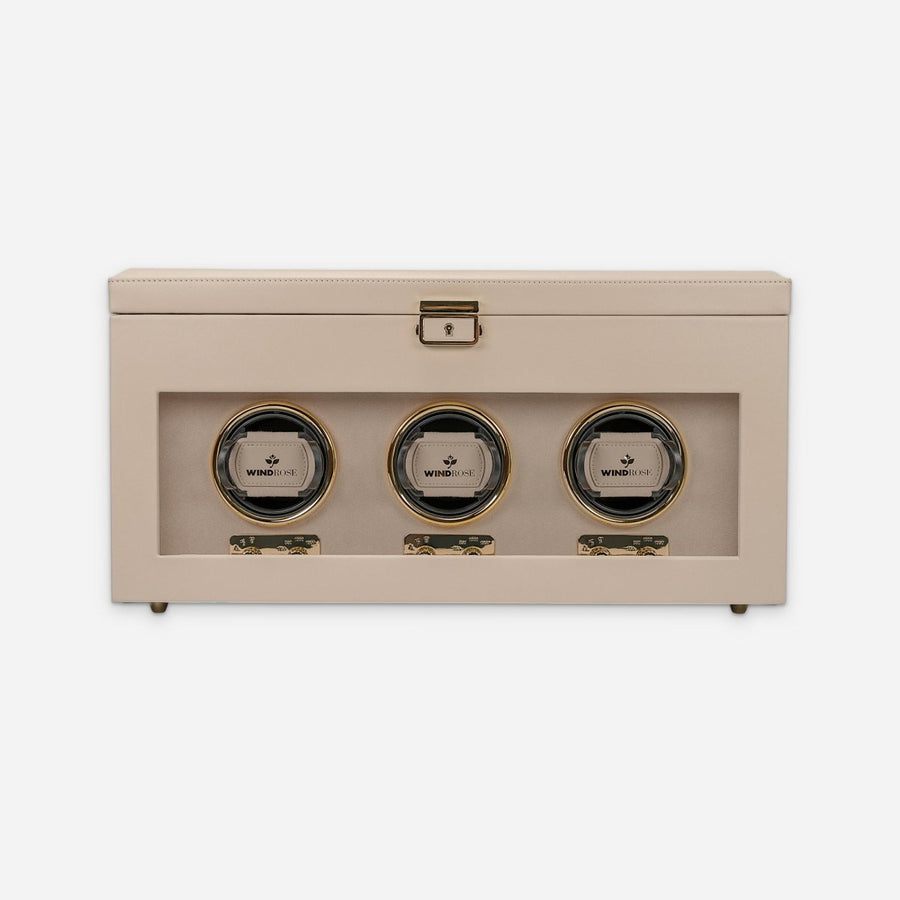 Watch winder Luxora voor 3 horloges van Windrose 1967 in Beige / Goud, gesloten, recht van voren met zicht op de winder achter het glas